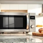 Showcase Microwave Oven Sales with a sleek stainless steel microwave in a modern kitchen setting.